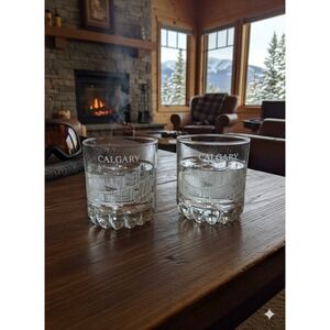 Calgary Promotional Drinking glass Set Of 2 Skiers EUC